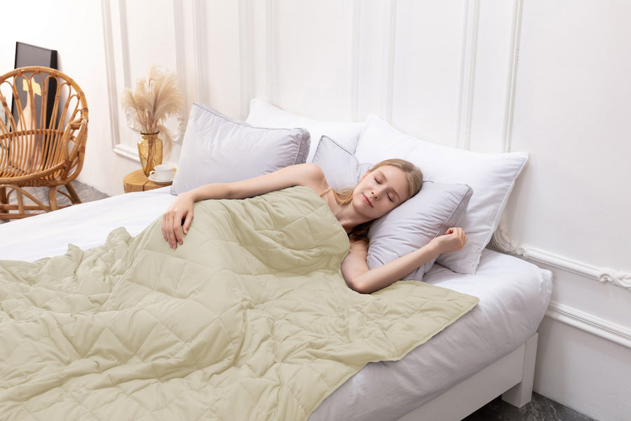 Mattress protector on a bed